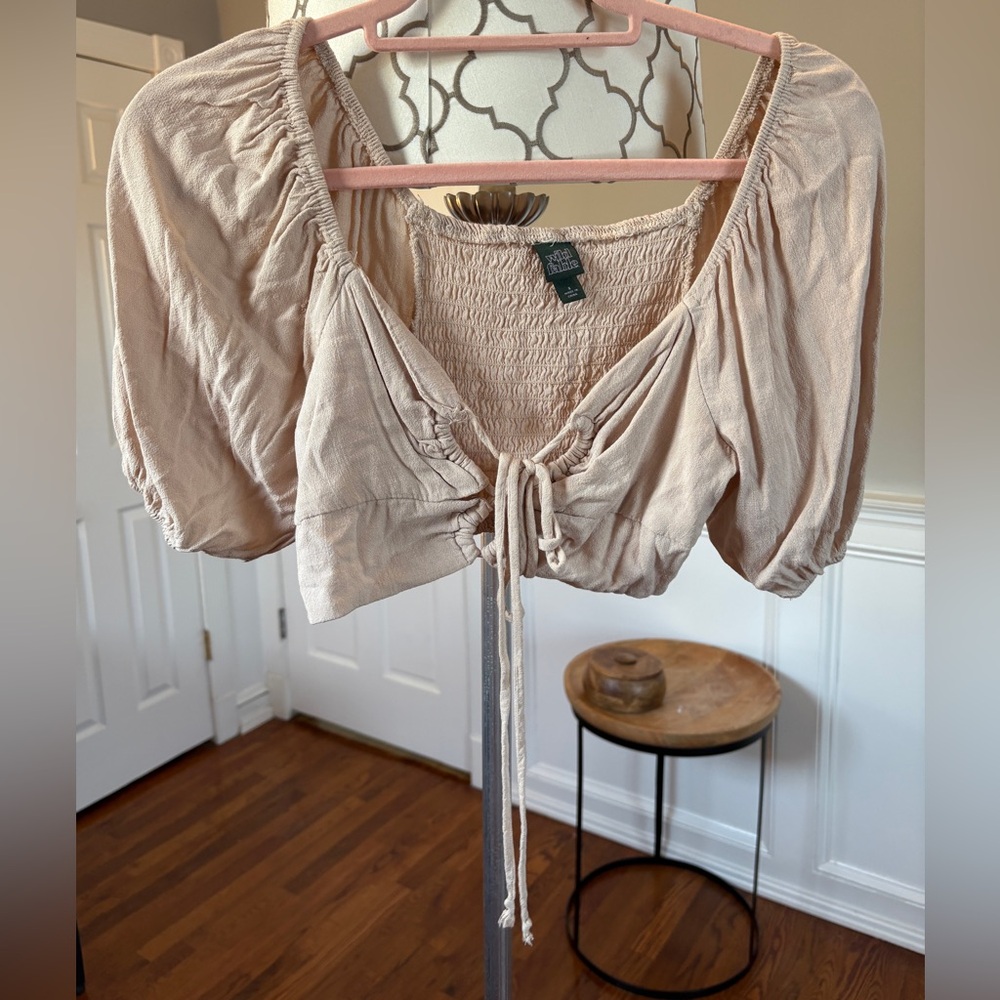 Cream wild fable crop top. Adjustable strings.